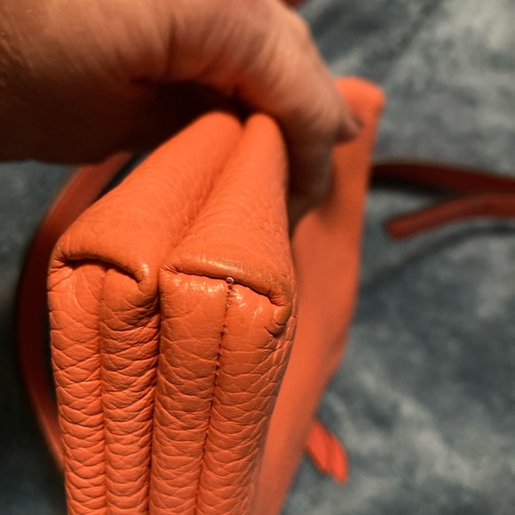 Michael Kors cross body/Shoulder/clutch purse. An orangey salmon colored. - Picture 10 of 13